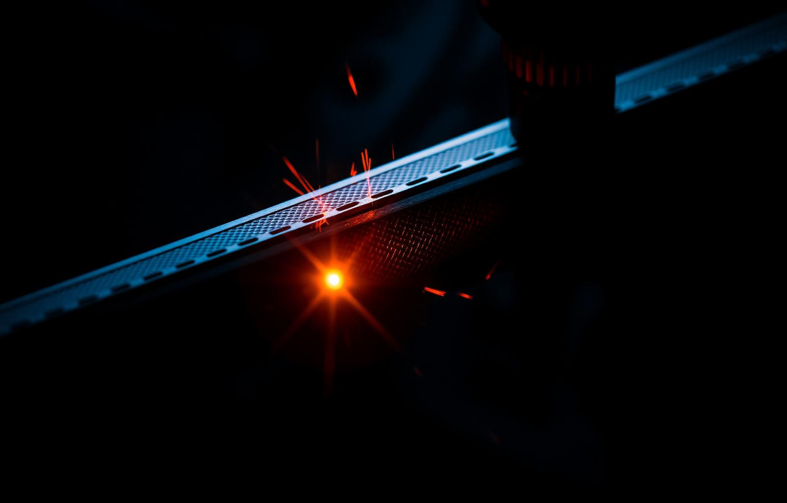 Fiber laser engraving a pistol slide
